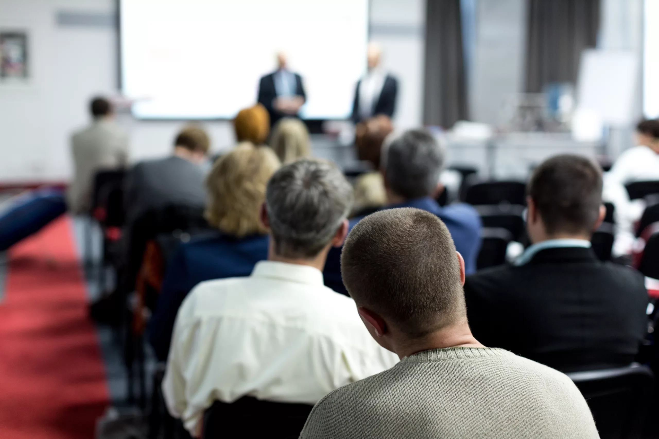 Tech professionals attending a meeting